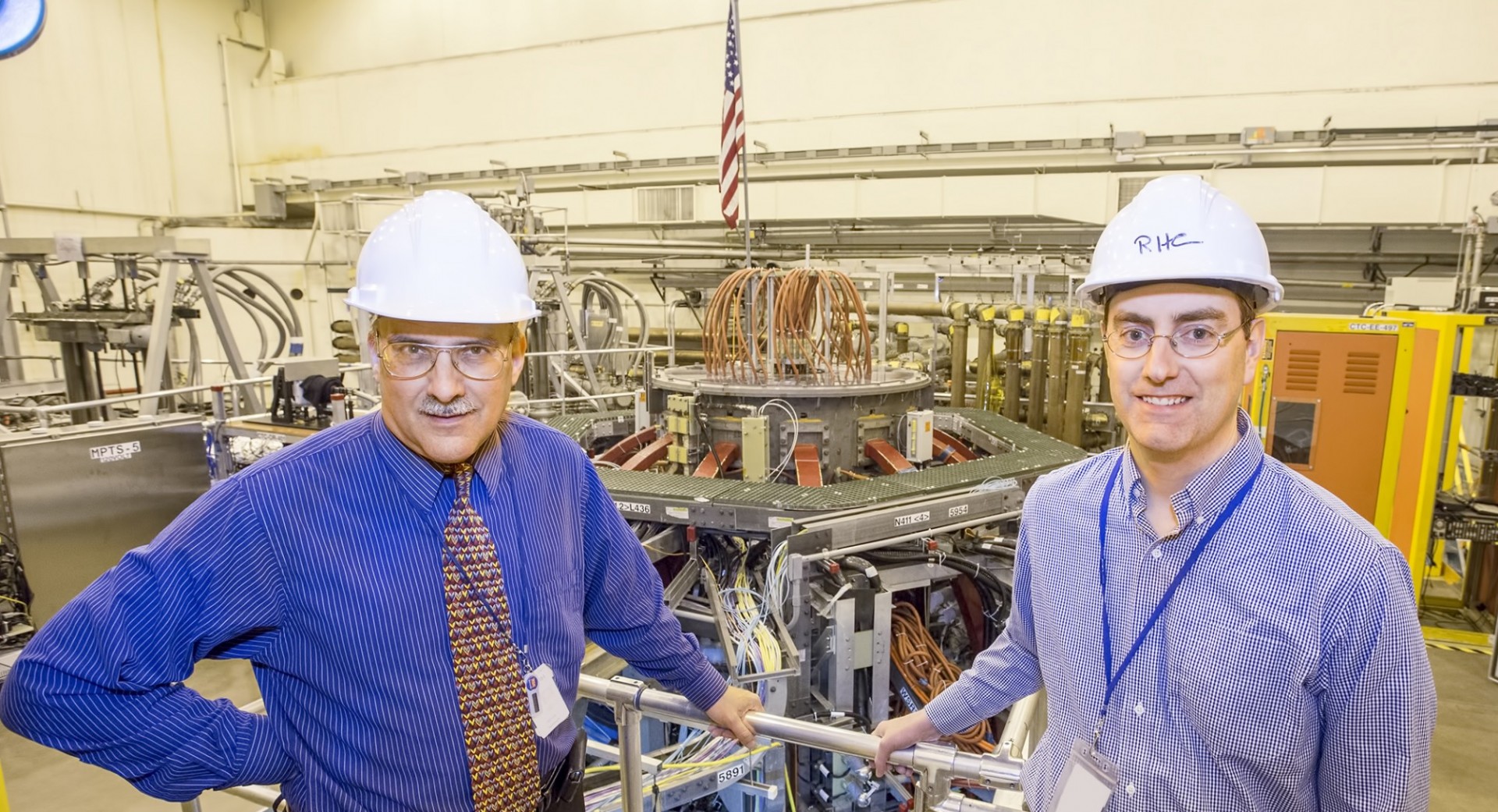 Columbia researchers Sabbagh and Berkery in front of the NSTX-U facility Columbia researchers Sabbagh and Berkery in front of the NSTX-U facility