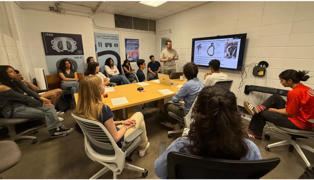 Students learn about fusion topics at an introductory lecture
